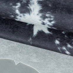 Etosha Vaskbart tæppe Imiteret koskind - Sort