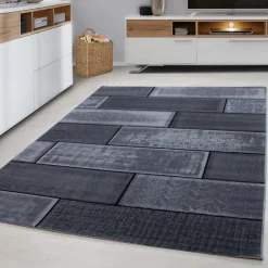 Plus Kortluvet tæppe Sten - Sort