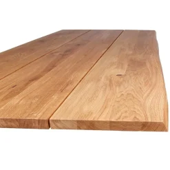 Spisebord af mørk olieret naturskårede egetræsplanker